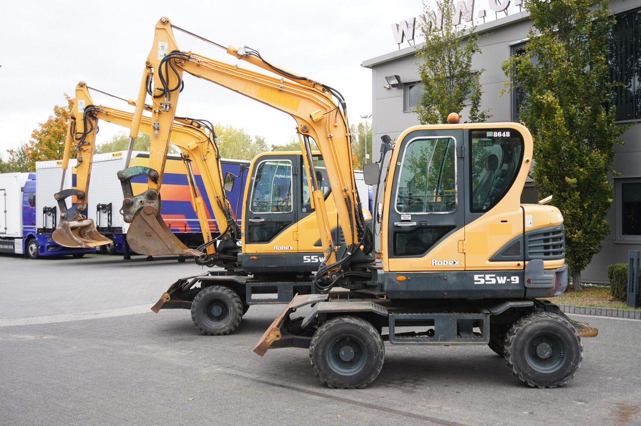 Hyundai Robex 55W-9 Wheeled Excavator 5.5t / 2pcs - Mini escavadeira: foto 1 Hyundai Robex 55W-9 Wheeled Excavator 5.5t / 2pcs - Mini escavadeira: foto 1
