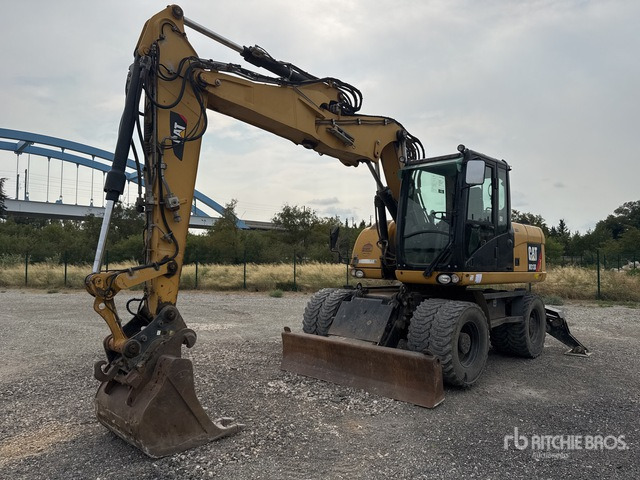 2012 Cat M313D Pelle Sur Pneus Wheel Excavator - Escavadeira de rodas: foto 1 2012 Cat M313D Pelle Sur Pneus Wheel Excavator - Escavadeira de rodas: foto 1