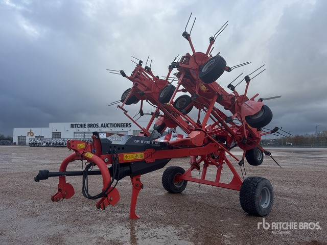 2013 Kuhn GF 8702 TG2 8.7 m Semi-Mount 8 Rotor Faneuse Hay Tedder - Ancinho enleirador: foto 1 2013 Kuhn GF 8702 TG2 8.7 m Semi-Mount 8 Rotor Faneuse Hay Tedder - Ancinho enleirador: foto 1
