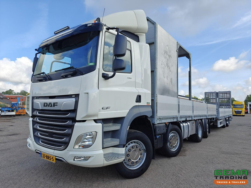 DAF CF 430 FAX 8x2/6 Dagcabine Euro6D - Machine Transporter + 2assige Aanhanger - Hydraulische Rampen - Afneembare 10.000L WaterTank - 20.000km! Origineel - Caminhão transporte de veículos: foto 1 DAF CF 430 FAX 8x2/6 Dagcabine Euro6D - Machine Transporter + 2assige Aanhanger - Hydraulische Rampen - Afneembare 10.000L WaterTank - 20.000km! Origineel - Caminhão transporte de veículos: foto 1