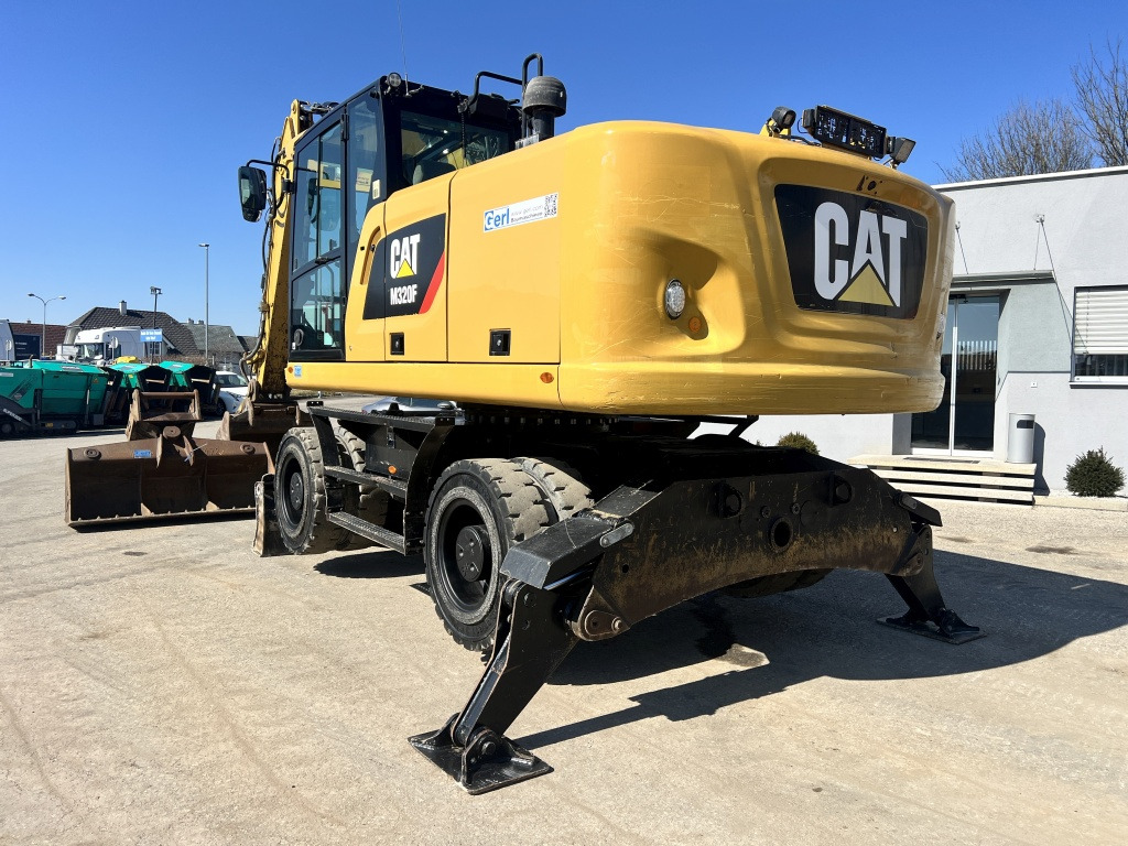 Caterpillar M 320 F (111527) - Escavadeira de rodas: foto 3 Caterpillar M 320 F (111527) - Escavadeira de rodas: foto 3