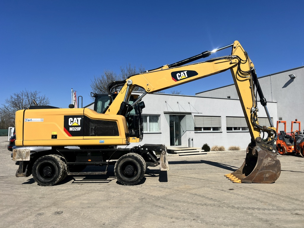 Caterpillar M 320 F (111527) - Escavadeira de rodas: foto 4 Caterpillar M 320 F (111527) - Escavadeira de rodas: foto 4