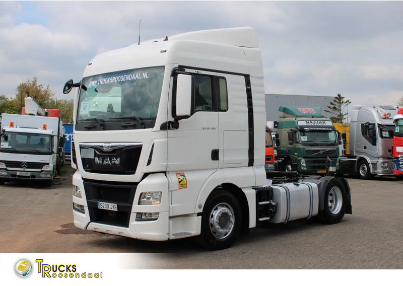 MAN TGX 18.480 + Euro 6 + Retarder + adr - Tractor: foto 1 MAN TGX 18.480 + Euro 6 + Retarder + adr - Tractor: foto 1