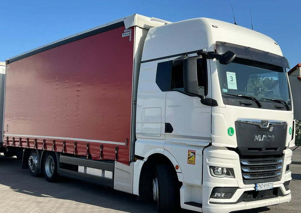 MAN TGX 26.470 z przyczepą Redos - Caminhão com lona: foto 3 MAN TGX 26.470 z przyczepą Redos - Caminhão com lona: foto 3