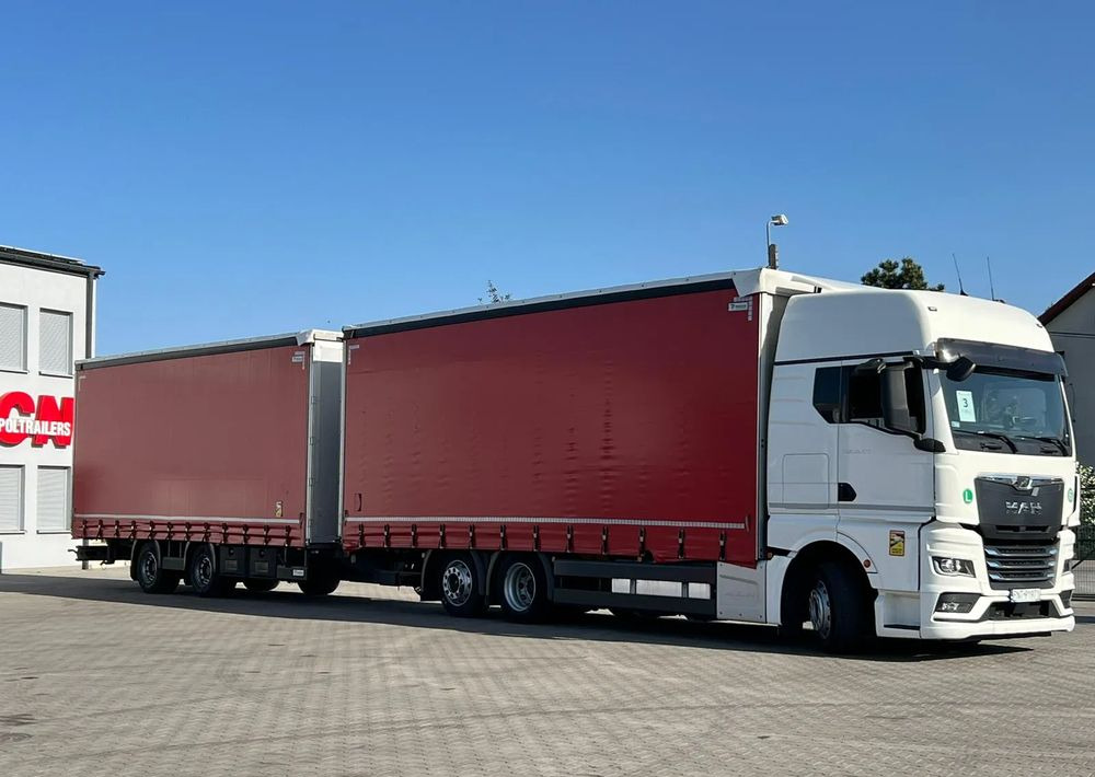 MAN TGX 26.470 z przyczepą Redos - Caminhão com lona: foto 2 MAN TGX 26.470 z przyczepą Redos - Caminhão com lona: foto 2