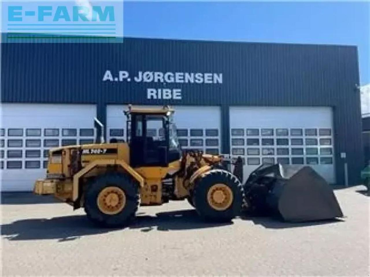 Hyundai hl 740-7 med højtipskovl - Mini escavadeira: foto 1 Hyundai hl 740-7 med højtipskovl - Mini escavadeira: foto 1