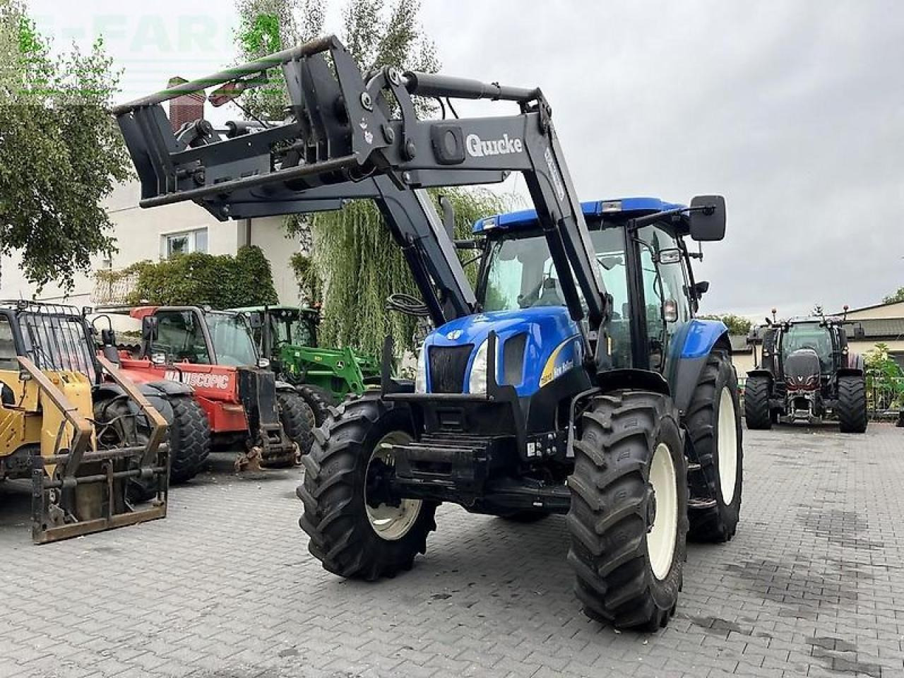 New Holland t6010 plus + quicke q55 Plus - Trator: foto 2 New Holland t6010 plus + quicke q55 Plus - Trator: foto 2