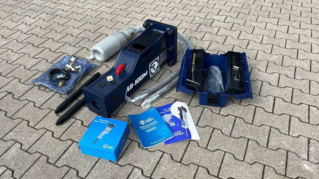 Hydraulikhammer AJCE 100M ohne Aufnahme - Martelo hidráulico de Máquina de construção: foto 1 Hydraulikhammer AJCE 100M ohne Aufnahme - Martelo hidráulico de Máquina de construção: foto 1