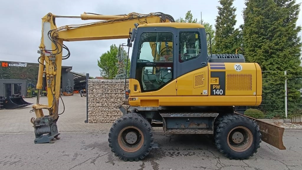 Komatsu PW 140 Mobilbagger Powertilt Schnellwechsler MS 10 - Escavadeira de rodas: foto 1 Komatsu PW 140 Mobilbagger Powertilt Schnellwechsler MS 10 - Escavadeira de rodas: foto 1