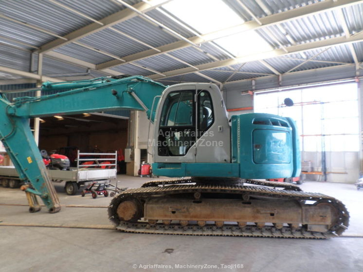 New Holland Kobelco Kobelco E 235 BSR-2 E 235 BSR-2 - Escavadora de rastos: foto 1 New Holland Kobelco Kobelco E 235 BSR-2 E 235 BSR-2 - Escavadora de rastos: foto 1