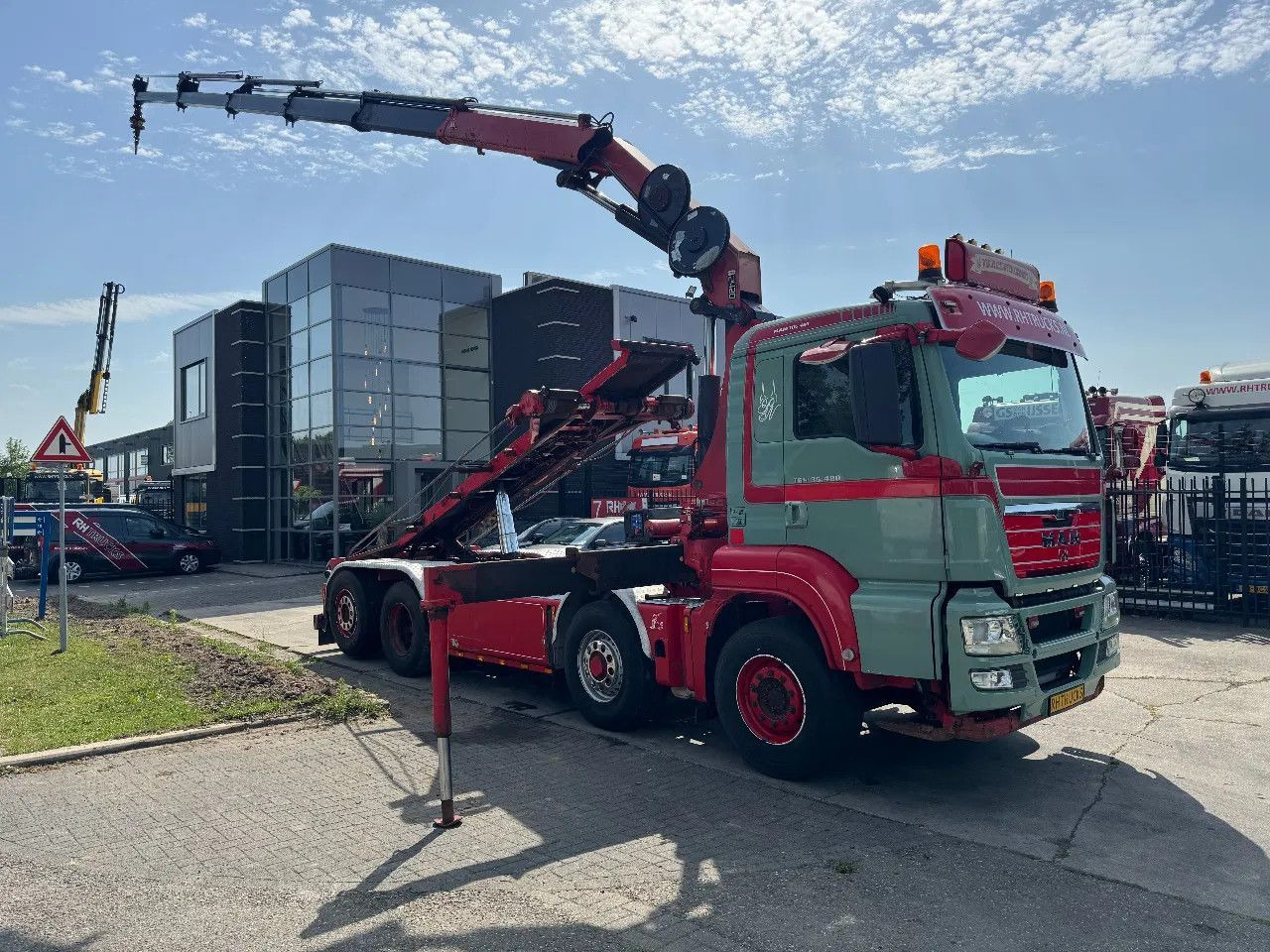 MAN TGS 35.480 8X4 HMF 2420 K5 + HMF ABLE + REMOTE C - Caminhão polibenne, Caminhão grua: foto 1 MAN TGS 35.480 8X4 HMF 2420 K5 + HMF ABLE + REMOTE C - Caminhão polibenne, Caminhão grua: foto 1