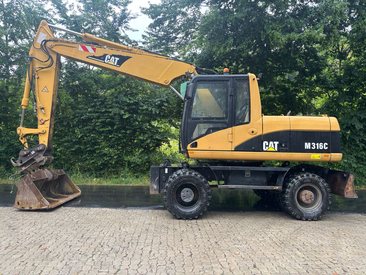 CATERPILLAR M 316 C - Escavadeira de rodas: foto 1 CATERPILLAR M 316 C - Escavadeira de rodas: foto 1