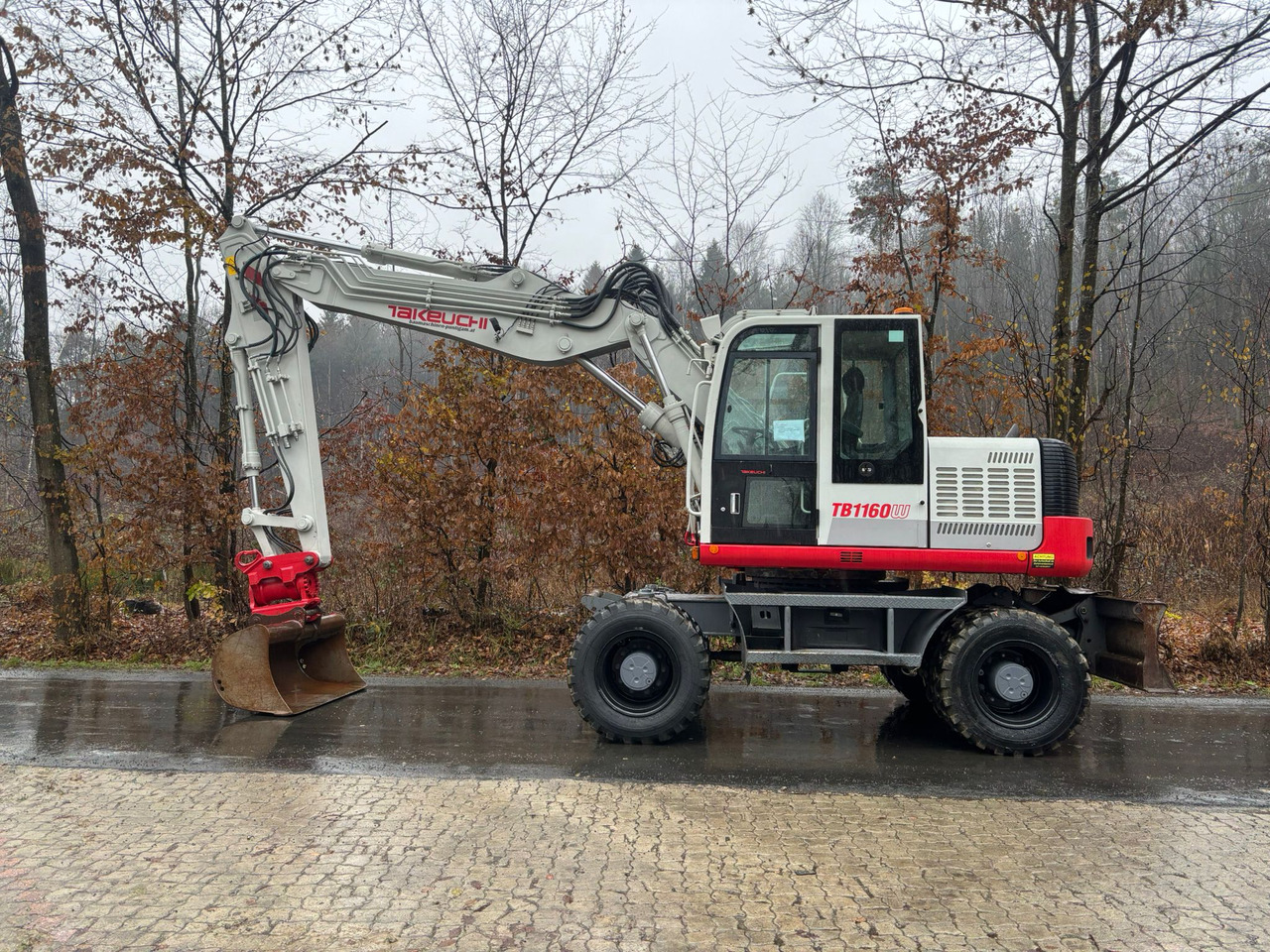 TAKEUCHI TB 1160 W - Escavadeira de rodas: foto 1 TAKEUCHI TB 1160 W - Escavadeira de rodas: foto 1