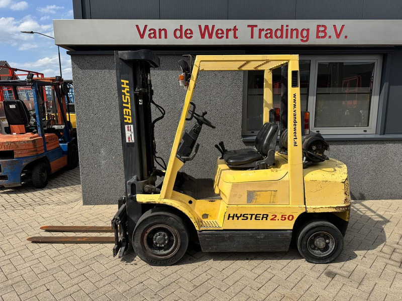 Hyster H2.50XM Triplo 470 Freelift / Sideshift LPG 1995 - Empilhadeira a gás: foto 1 Hyster H2.50XM Triplo 470 Freelift / Sideshift LPG 1995 - Empilhadeira a gás: foto 1