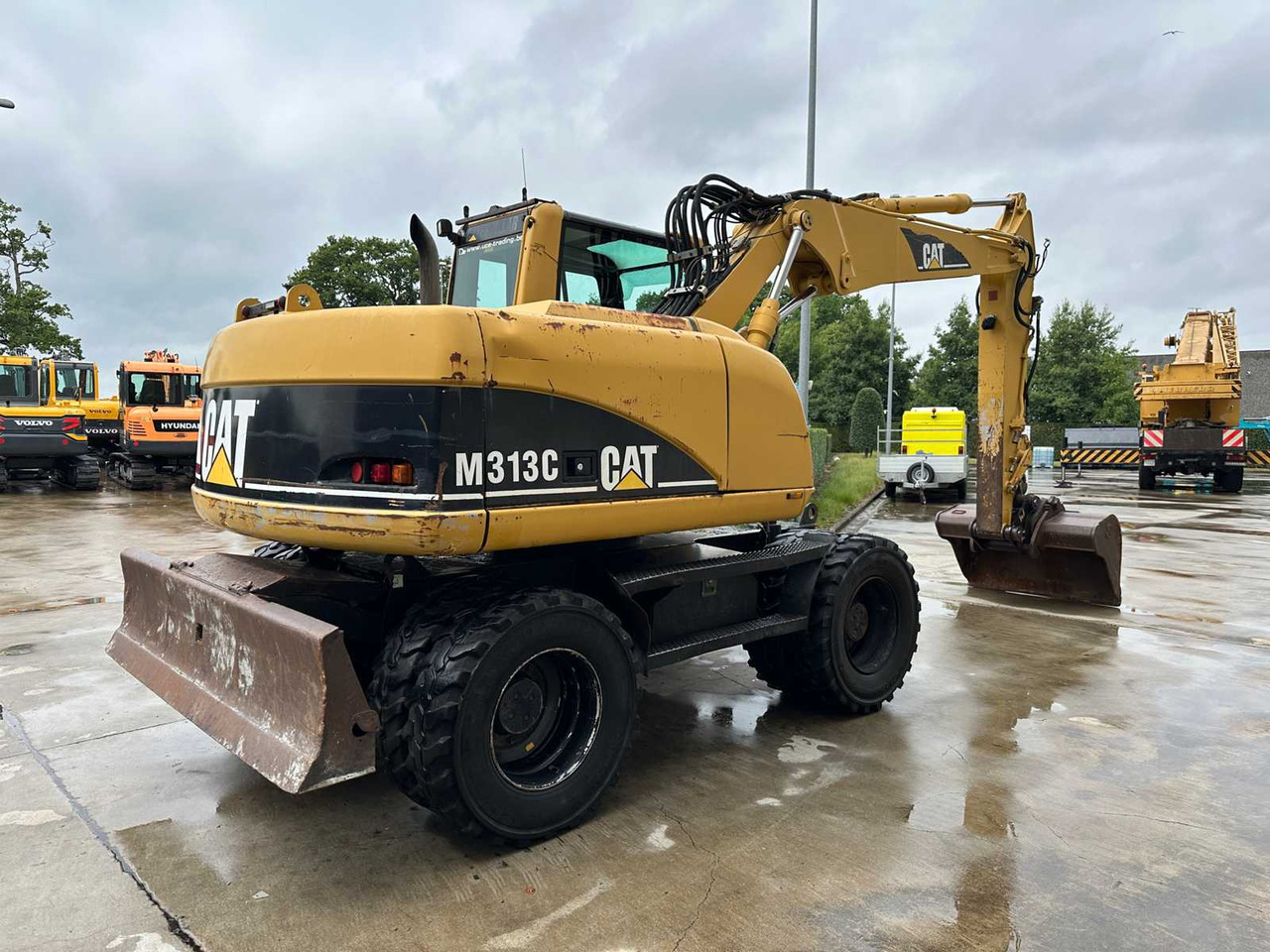 Caterpillar M313C - Escavadeira de rodas: foto 4 Caterpillar M313C - Escavadeira de rodas: foto 4