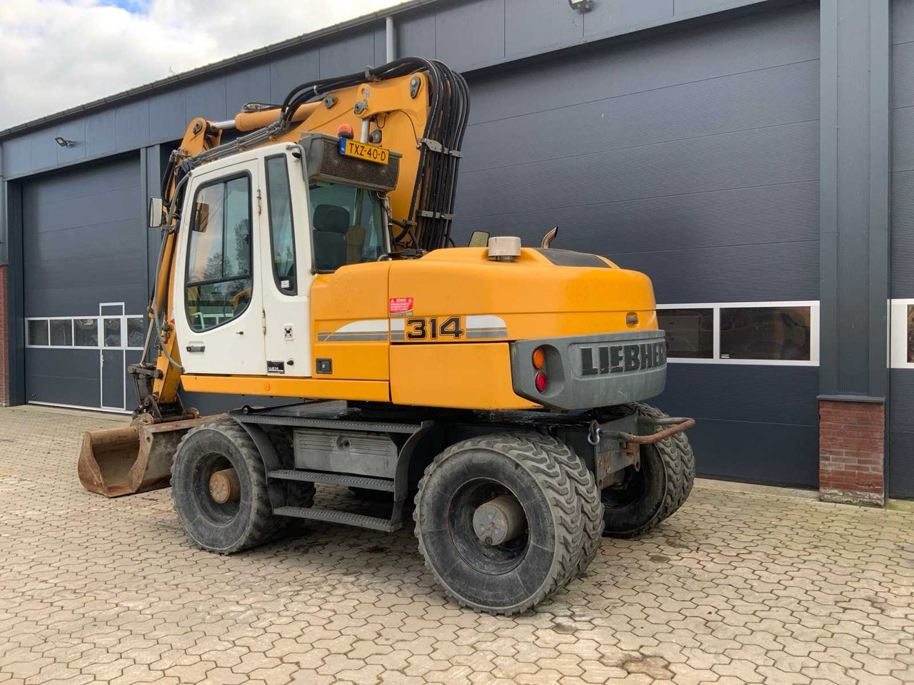 Liebherr A314 Litronic - Escavadeira de rodas: foto 5 Liebherr A314 Litronic - Escavadeira de rodas: foto 5