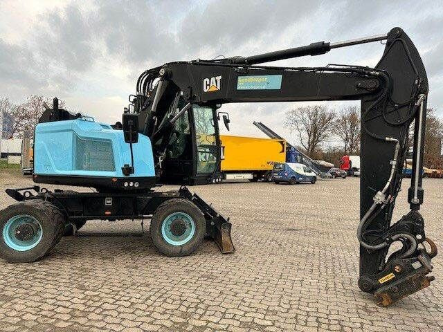Caterpillar M315F, OilQuick, Hammer- u- Greifersteuerung - Escavadeira de rodas: foto 2 Caterpillar M315F, OilQuick, Hammer- u- Greifersteuerung - Escavadeira de rodas: foto 2