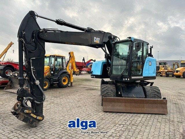 Caterpillar M315F, OilQuick, Hammer- u- Greifersteuerung - Escavadeira de rodas: foto 1 Caterpillar M315F, OilQuick, Hammer- u- Greifersteuerung - Escavadeira de rodas: foto 1