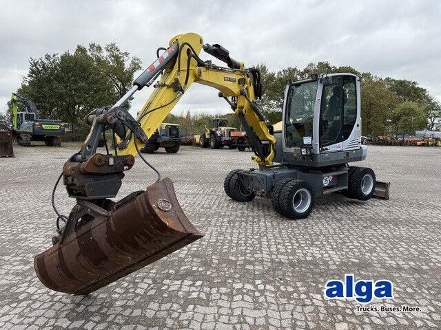 Neuson EW65, Verstellausleger, Hydr. S.W.S.,Div. Löffel - Escavadeira de rodas: foto 1 Neuson EW65, Verstellausleger, Hydr. S.W.S.,Div. Löffel - Escavadeira de rodas: foto 1