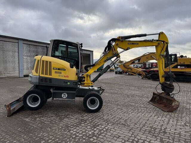 Neuson EW65, Verstellausleger, Hydr. S.W.S.,Div. Löffel - Escavadeira de rodas: foto 5 Neuson EW65, Verstellausleger, Hydr. S.W.S.,Div. Löffel - Escavadeira de rodas: foto 5