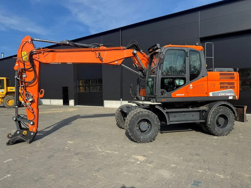 Doosan DX140-5 2018 - Escavadeira de rodas: foto 2 Doosan DX140-5 2018 - Escavadeira de rodas: foto 2