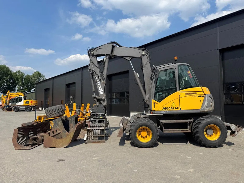 Mecalac 714MW FULL ATTACHMENTS OVERCOMPLEET !!! - Escavadeira de rodas: foto 3 Mecalac 714MW FULL ATTACHMENTS OVERCOMPLEET !!! - Escavadeira de rodas: foto 3