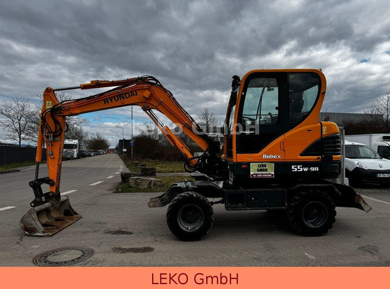 Hyundai Robex 55W-9A Mit Drei Löffeln - Escavadeira de rodas: foto 4 Hyundai Robex 55W-9A Mit Drei Löffeln - Escavadeira de rodas: foto 4