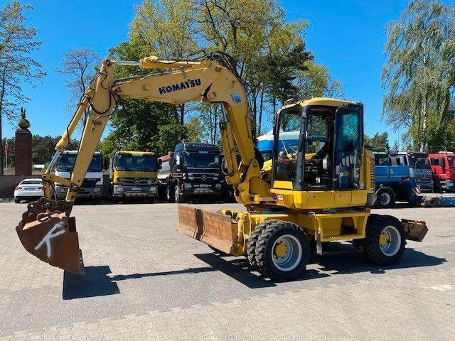 Komatsu PW 118 MR-8 - Escavadeira de rodas: foto 1 Komatsu PW 118 MR-8 - Escavadeira de rodas: foto 1