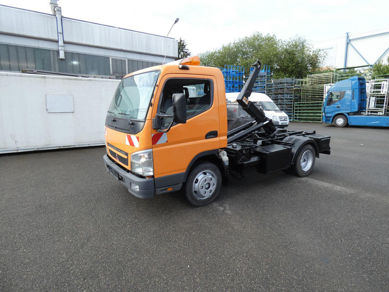 Mitsubishi Canter Fuso Abrollkipper - Camião de caixa aberta/ Plataforma, Caminhão grua: foto 1 Mitsubishi Canter Fuso Abrollkipper - Camião de caixa aberta/ Plataforma, Caminhão grua: foto 1