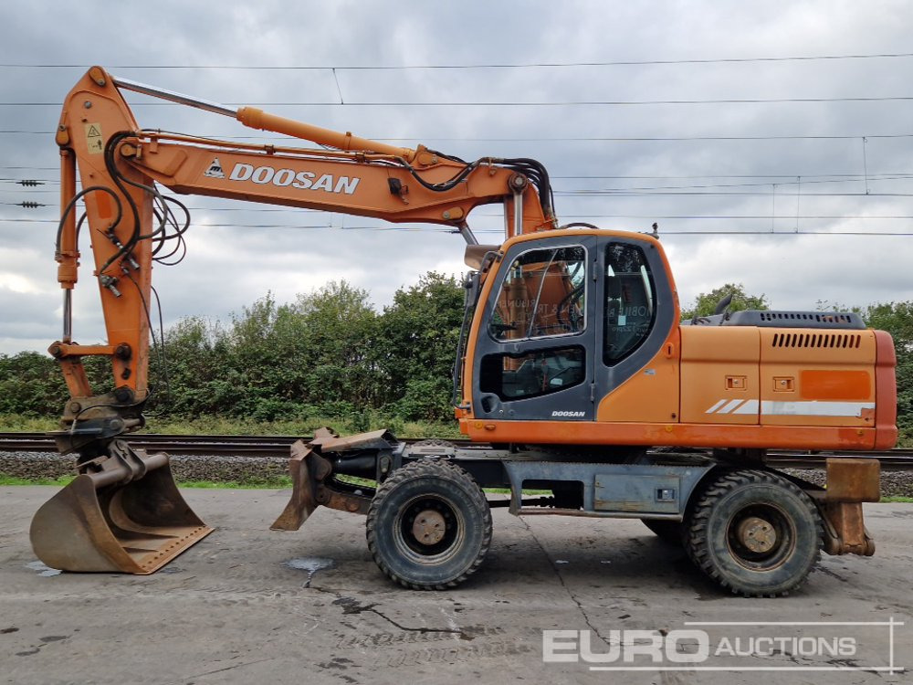 Doosan DX210W - Escavadeira de rodas: foto 2 Doosan DX210W - Escavadeira de rodas: foto 2