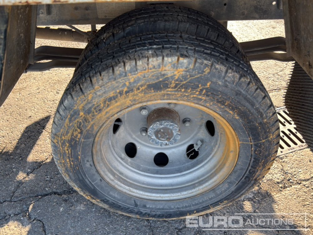 Camião de caixa aberta/ Plataforma 1999 Nissan Cabstar: foto 11 Camião de caixa aberta/ Plataforma 1999 Nissan Cabstar: foto 11