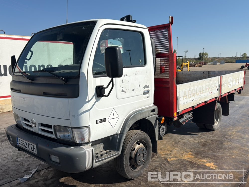 2004 Nissan Cabstar - Camião de caixa aberta/ Plataforma: foto 1 2004 Nissan Cabstar - Camião de caixa aberta/ Plataforma: foto 1