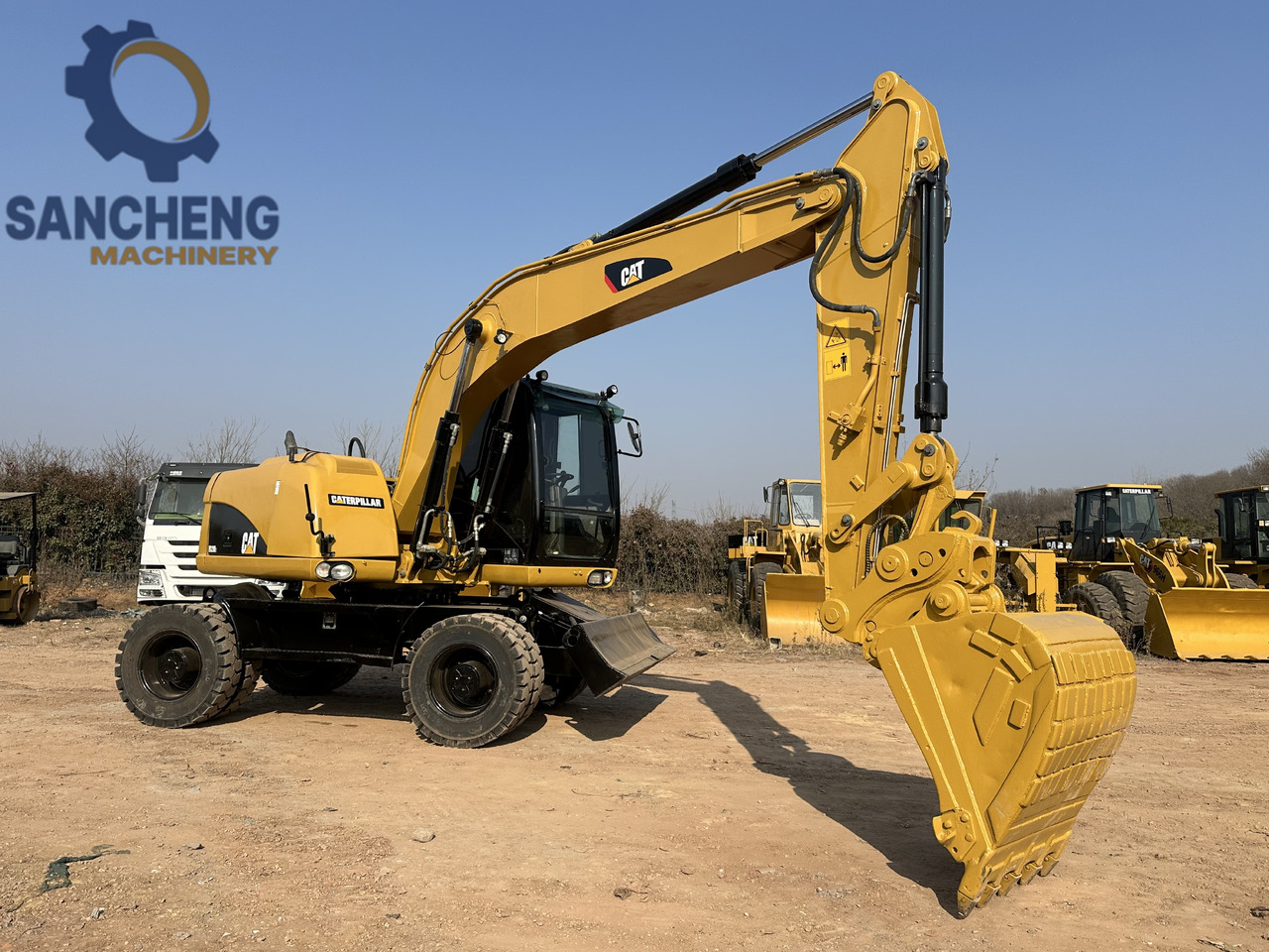 Escavadeira de rodas CATERPILLAR M320D2: foto 8
