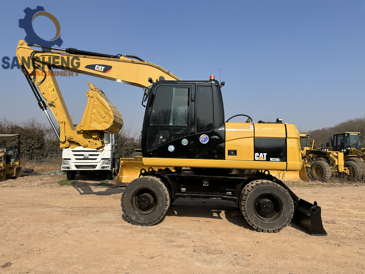 Escavadeira de rodas CATERPILLAR M320D2: foto 10
