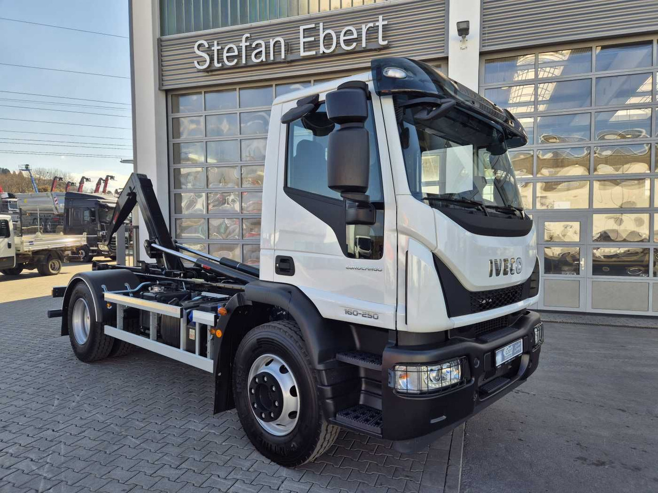 Iveco Eurocargo ML160E25/P HIAB Multilift XR10S4150 - Caminhão polibenne: foto 1 Iveco Eurocargo ML160E25/P HIAB Multilift XR10S4150 - Caminhão polibenne: foto 1