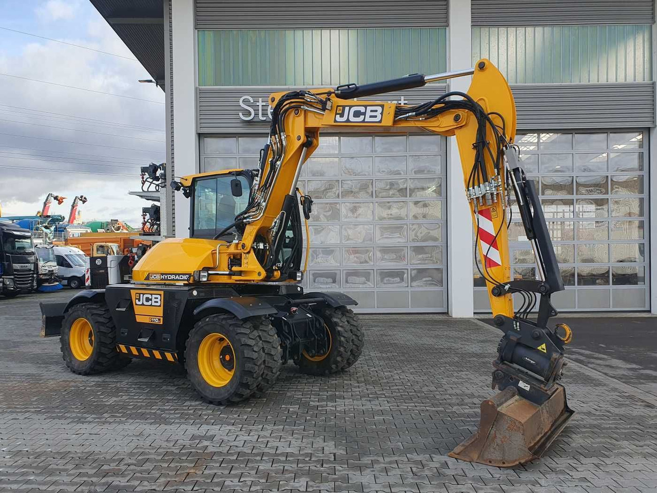 JCB Hydradig HD 110WT / 2022 / nur 239h! / Powertilt - Escavadeira de rodas: foto 1 JCB Hydradig HD 110WT / 2022 / nur 239h! / Powertilt - Escavadeira de rodas: foto 1