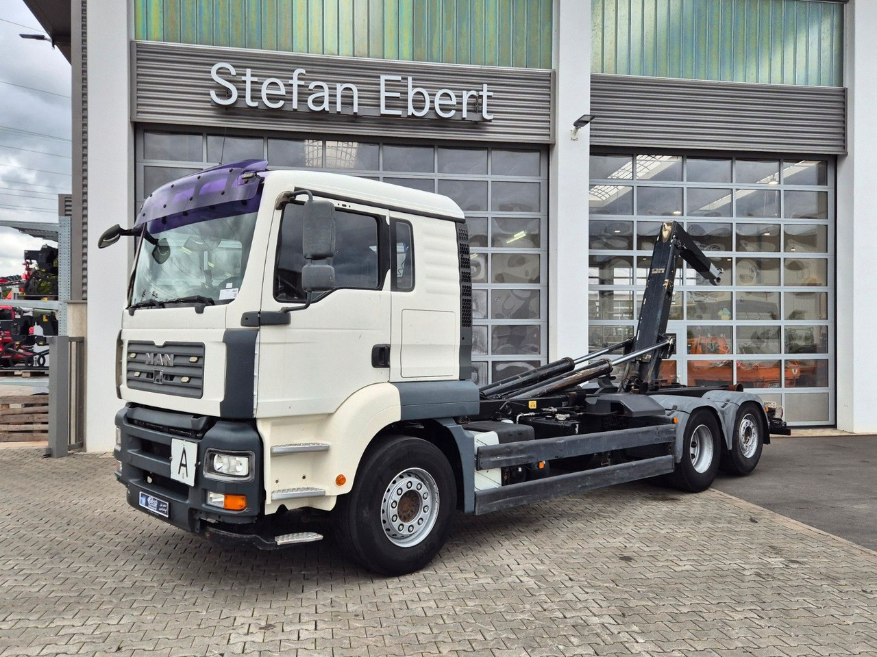 MAN TGA 26.440 6x2-2 BL Meiller RK 20.70 Bett - Caminhão polibenne: foto 1 MAN TGA 26.440 6x2-2 BL Meiller RK 20.70 Bett - Caminhão polibenne: foto 1