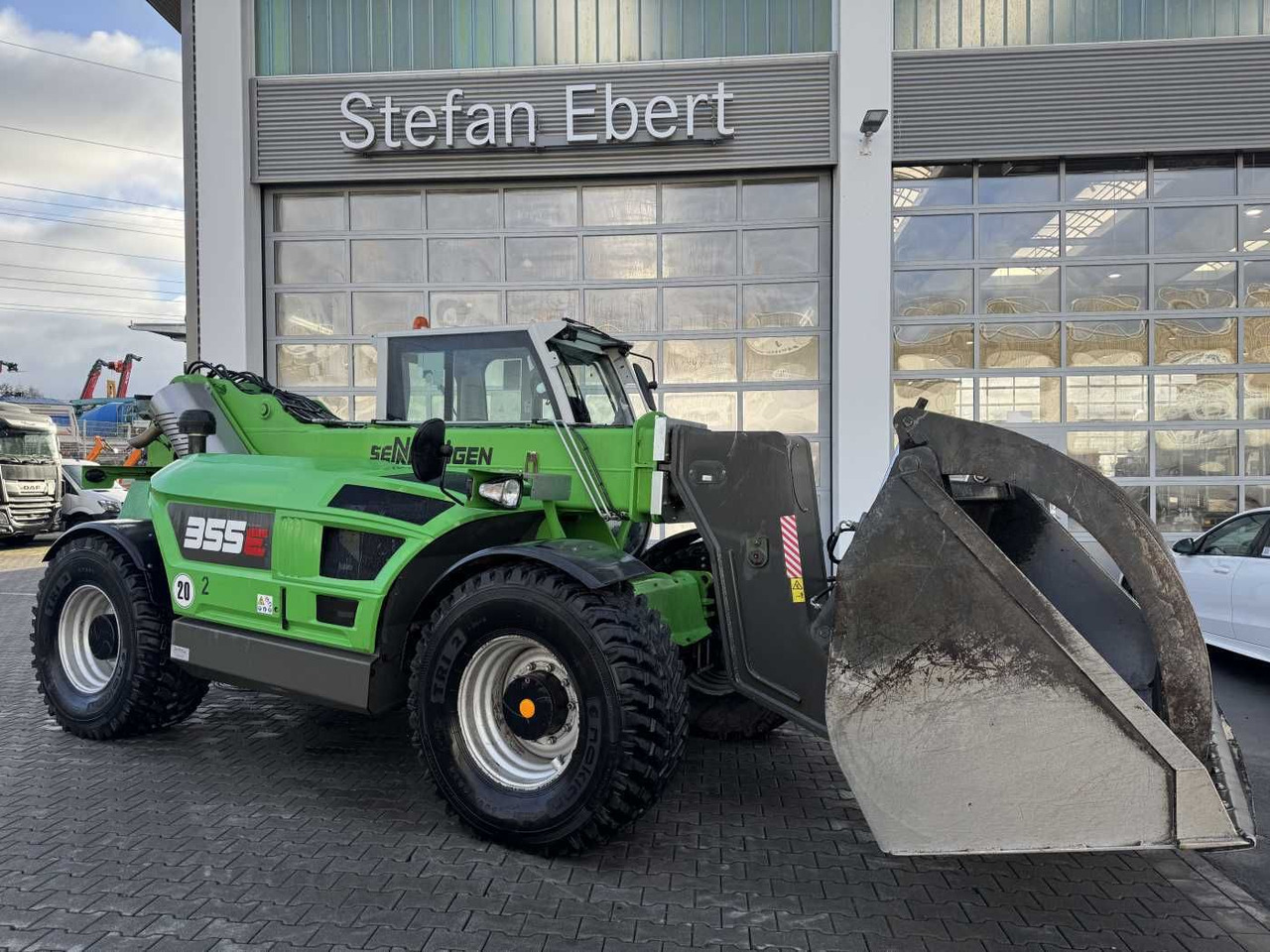 Sennebogen 355 E / Greifschaufel / nur 2.260h! - Carregadeira de rodas: foto 1 Sennebogen 355 E / Greifschaufel / nur 2.260h! - Carregadeira de rodas: foto 1