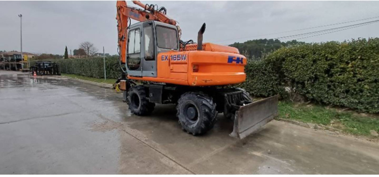 FIAT ALLIS / NEW HOLLAND EX165W - Escavadeira de rodas: foto 3 FIAT ALLIS / NEW HOLLAND EX165W - Escavadeira de rodas: foto 3