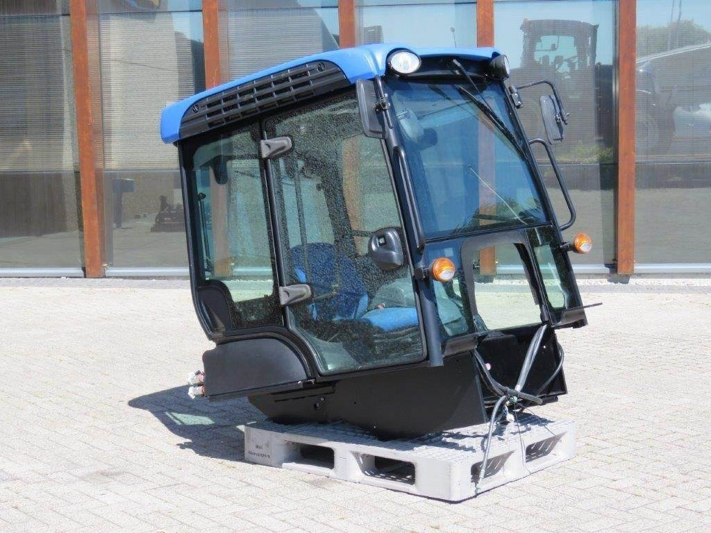 New Holland TK - Cabine de Máquina de construção: foto 4 New Holland TK - Cabine de Máquina de construção: foto 4