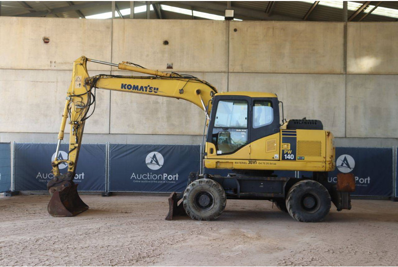Komatsu PW140-7 - Escavadeira de rodas: foto 2 Komatsu PW140-7 - Escavadeira de rodas: foto 2