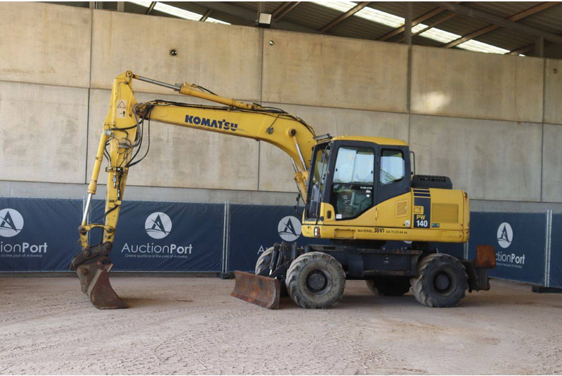 Komatsu PW140-7 - Escavadeira de rodas: foto 1 Komatsu PW140-7 - Escavadeira de rodas: foto 1