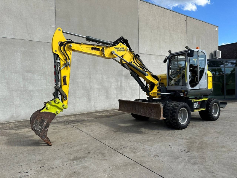 Neuson EW100 - Escavadeira de rodas: foto 1 Neuson EW100 - Escavadeira de rodas: foto 1