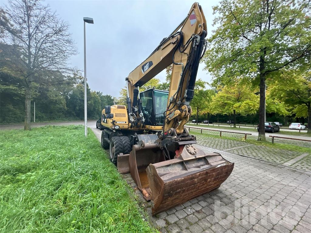 CAT M 318D - Escavadeira de rodas: foto 2 CAT M 318D - Escavadeira de rodas: foto 2