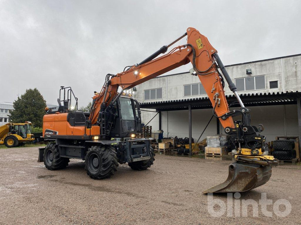 Doosan DX 140W - Escavadeira de rodas: foto 1 Doosan DX 140W - Escavadeira de rodas: foto 1