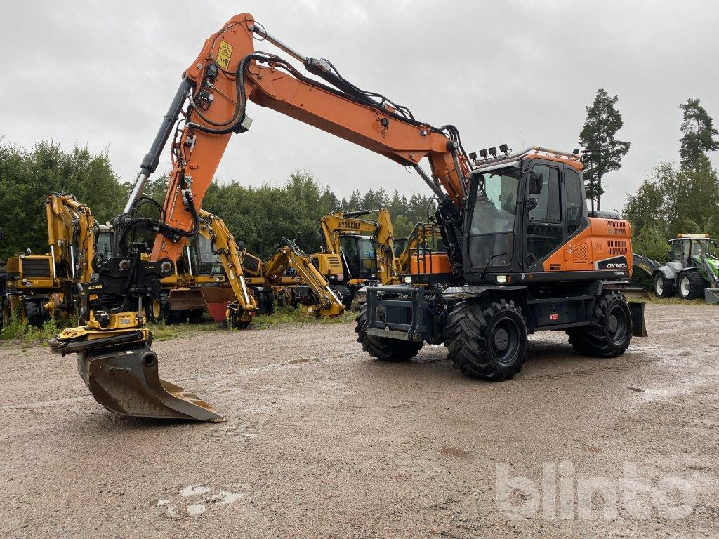 Doosan DX 140W - Escavadeira de rodas: foto 2 Doosan DX 140W - Escavadeira de rodas: foto 2