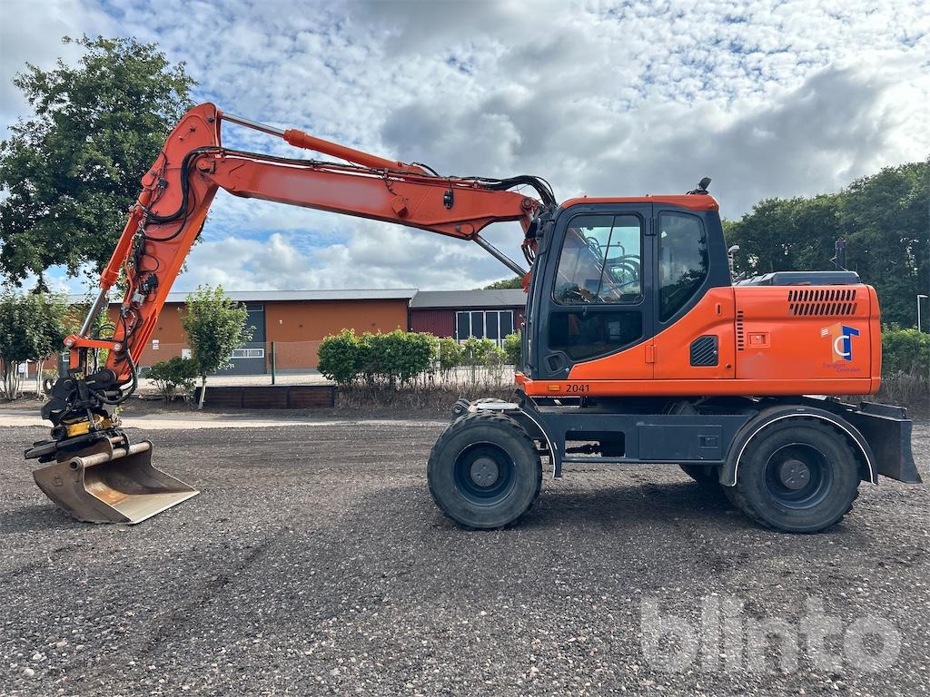 Doosan DX160W - Escavadeira de rodas: foto 1 Doosan DX160W - Escavadeira de rodas: foto 1