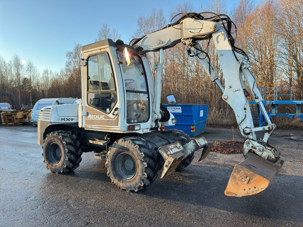 Mecalac 12MXT - Escavadeira de rodas: foto 4 Mecalac 12MXT - Escavadeira de rodas: foto 4