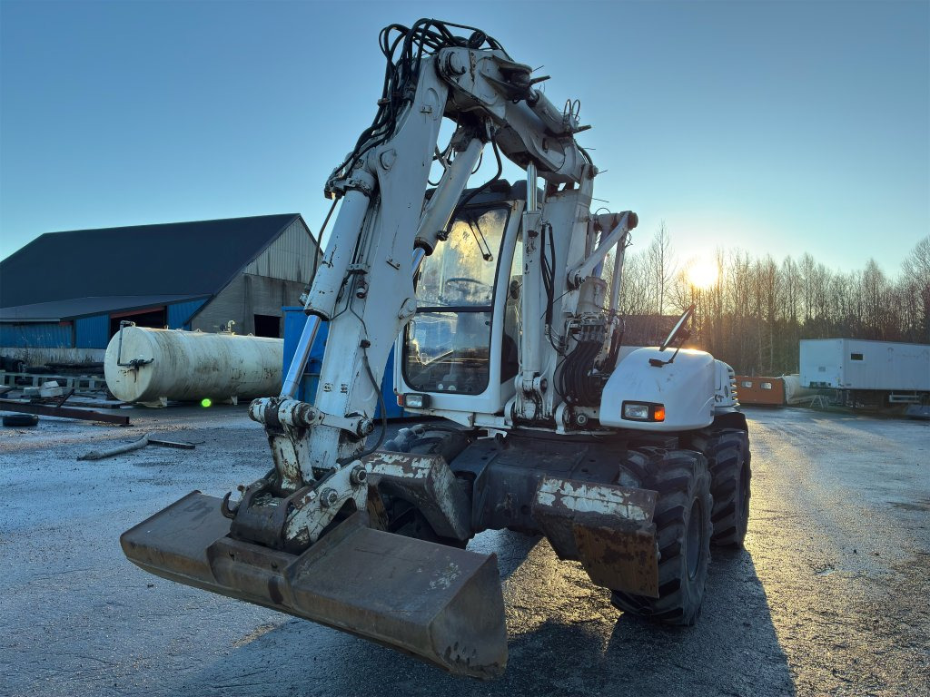 Mecalac 12MXT - Escavadeira de rodas: foto 2 Mecalac 12MXT - Escavadeira de rodas: foto 2