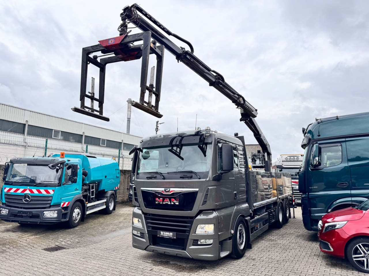 MAN 26.460 TGX Baustoffkran HMF 2110-L3 - Caminhão grua: foto 4 MAN 26.460 TGX Baustoffkran HMF 2110-L3 - Caminhão grua: foto 4
